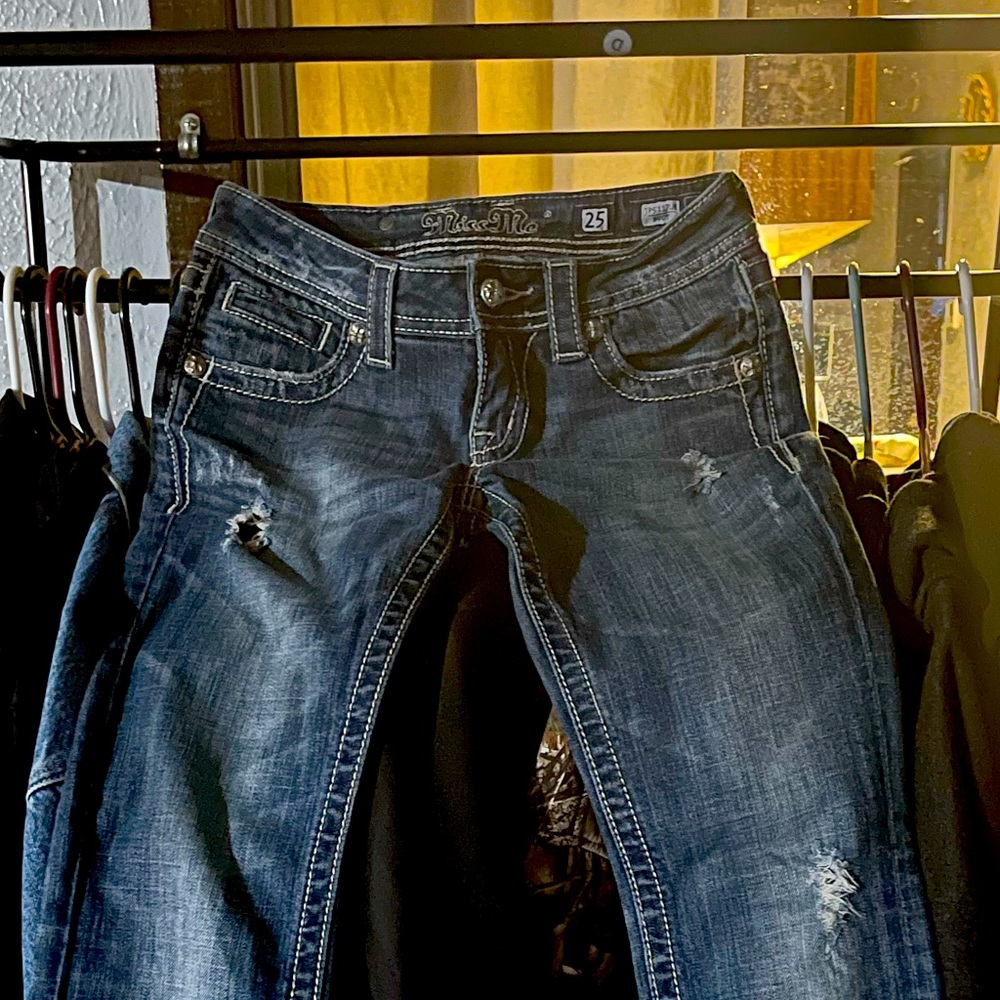 Miss me size 25X31 holes in pants are how they came